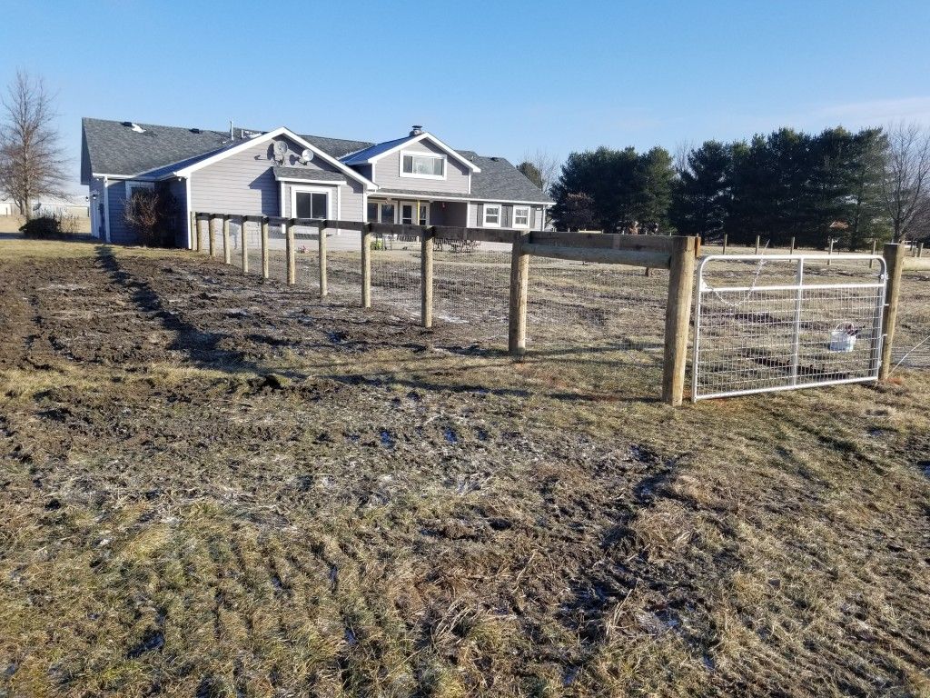 House With A Newly Constructed Fence In The Foreground - Columbus, IN - Indiana Agricultural Fencing