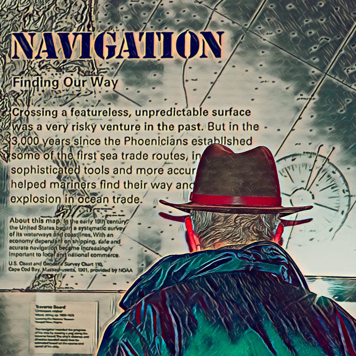 A man in a hat is looking at a map that says navigation