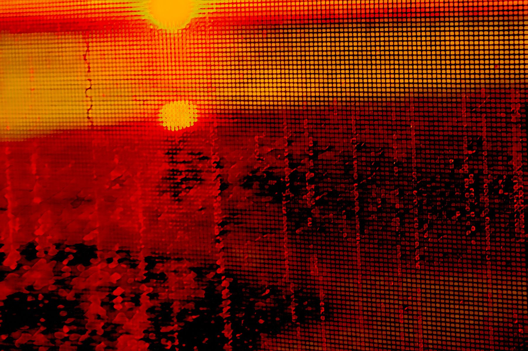 It looks like a painting of a sunset with the sun reflected in the water.