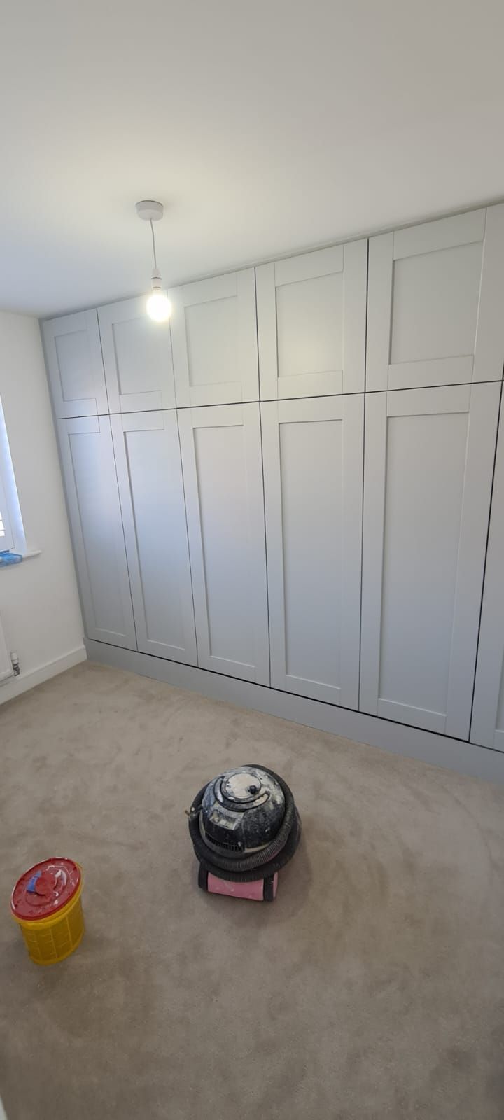 A picture of wood panelling painted in dove grey by painters and decorators Southampton