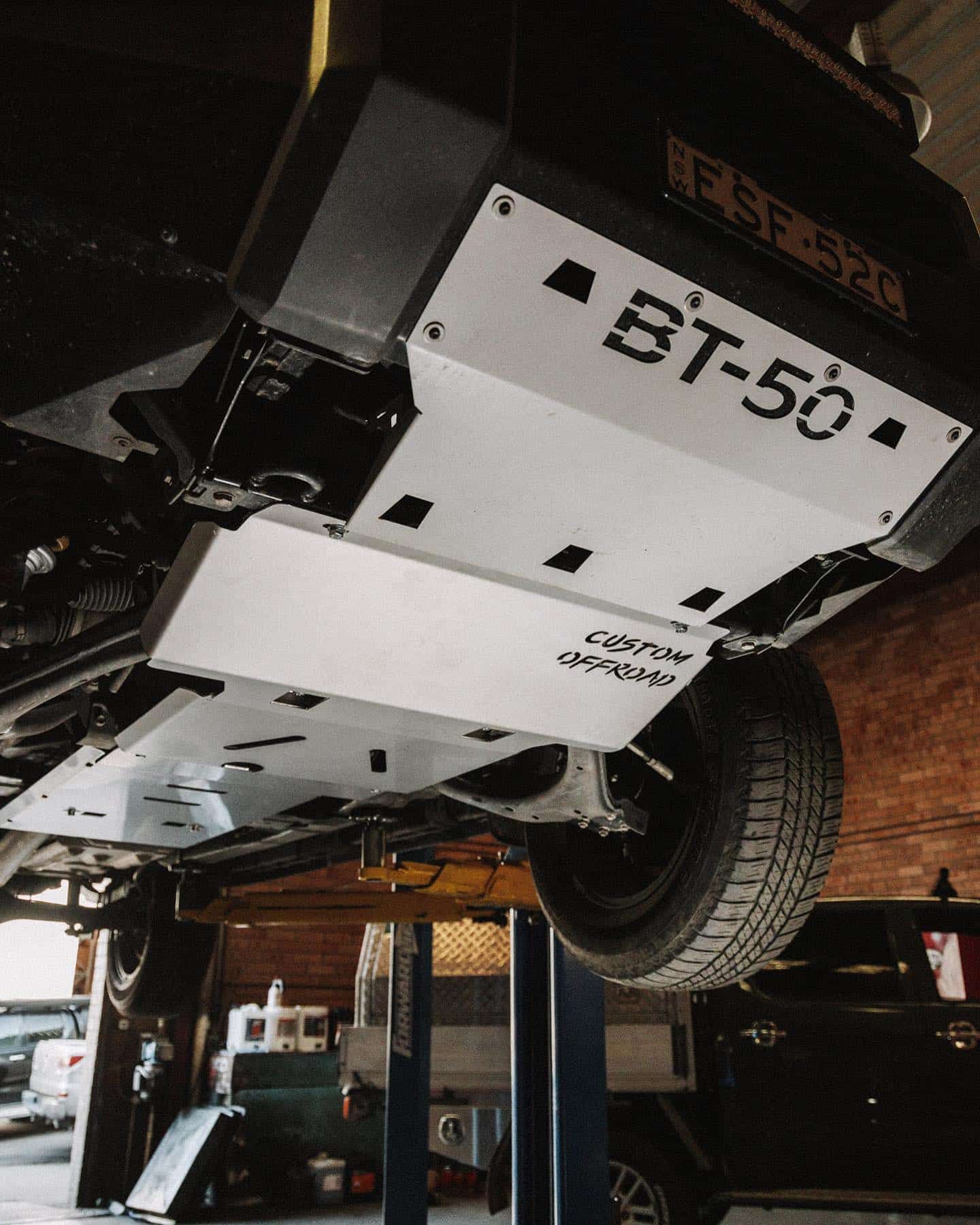 A Bash Plate is on the Underside of a Vehicle — Nationwide Auto Service Centre in West Gosford, NSW