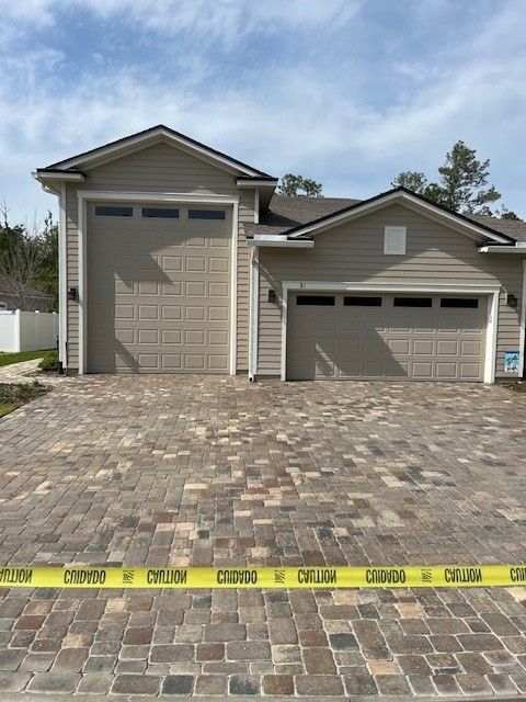 After Pressure Wash the Front of Garage - Palm Coast, FL - Stressless Pressure Washing and Paver Sealing