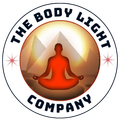 Logo for The Body Light Company featuring a red silhouette in a meditative pose before pyramids inside a circular frame.