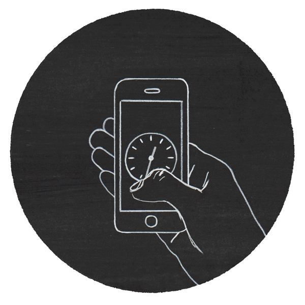 Hand holding a phone with a clock icon on the screen, depicted in white chalk on a black circle.