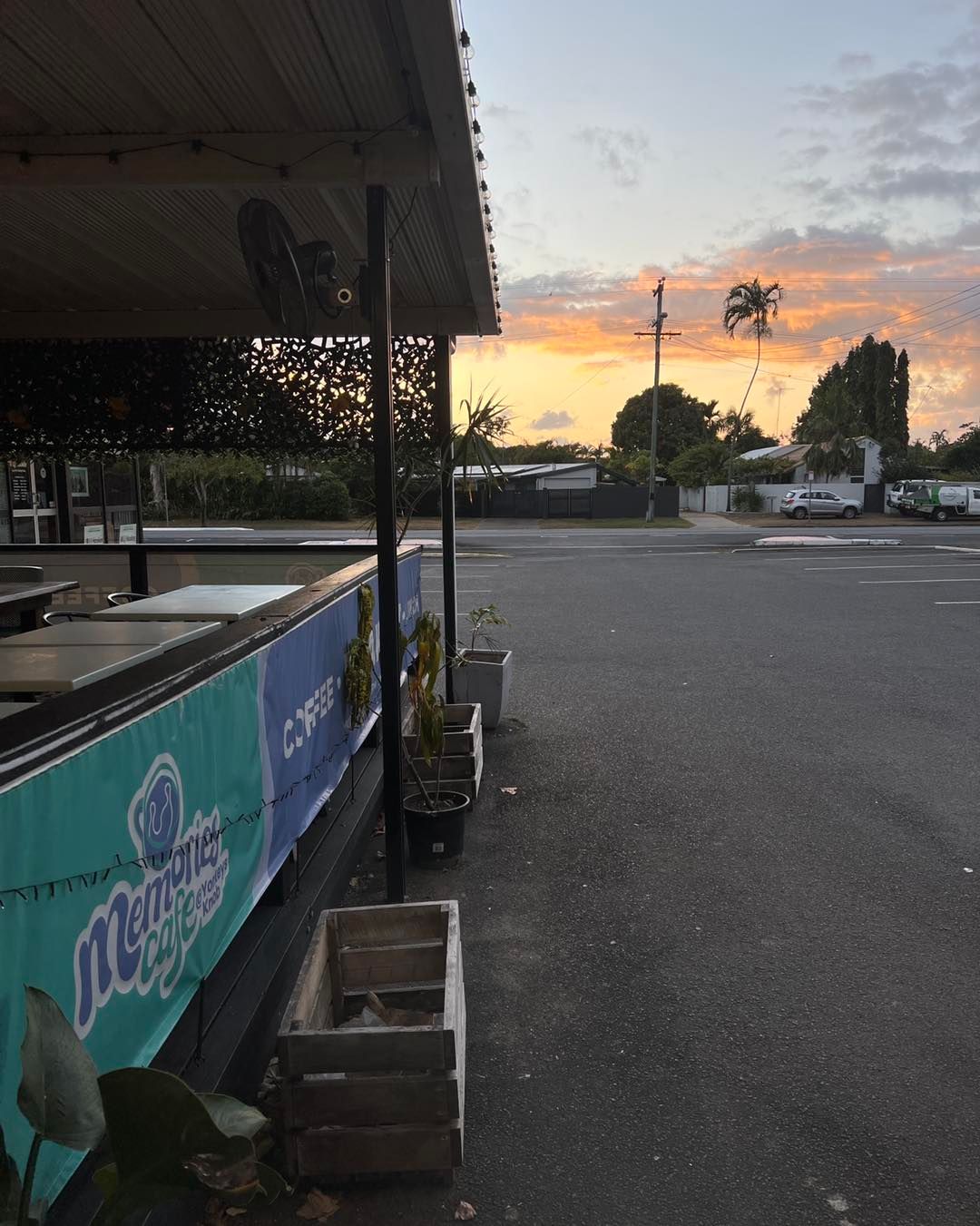 Sunset Over a Parking Lot With a Bar — Memories Cafe @ Yorkeys Knob in Yorkeys Knob, QLD