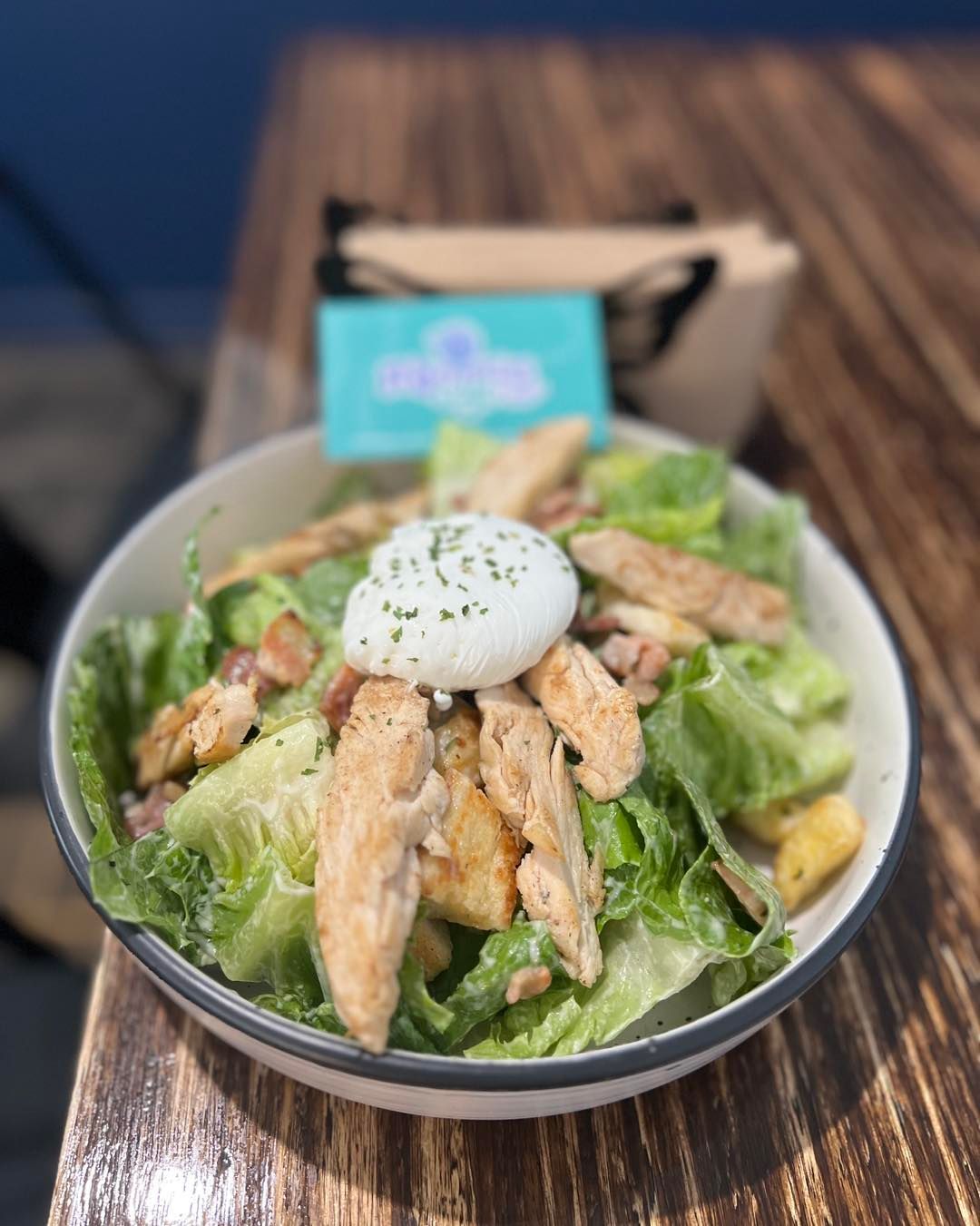 Caesar Salad With Grilled Chicken, Bacon, and a Poached Egg — Memories Cafe @ Yorkeys Knob in Yorkeys Knob, QLD
