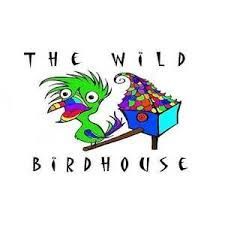 “The Wild Birdhouse” logo with a colorful bird beside a blue birdhouse filled with flowers