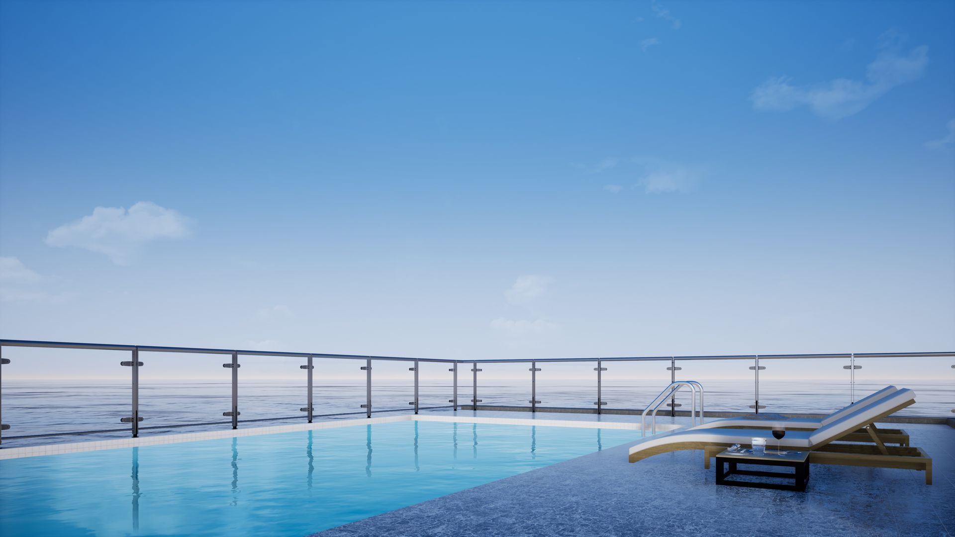 Infinity Pool Overlooking the Ocean, With a Lounge Chair. Bright Blue Sky and Water — Sams Glass Solutions in Bowen, QLD