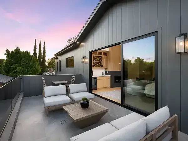 Rooftop Patio With White Furniture, Gray Siding — Sams Glass Solutions in Proserpine, QLD