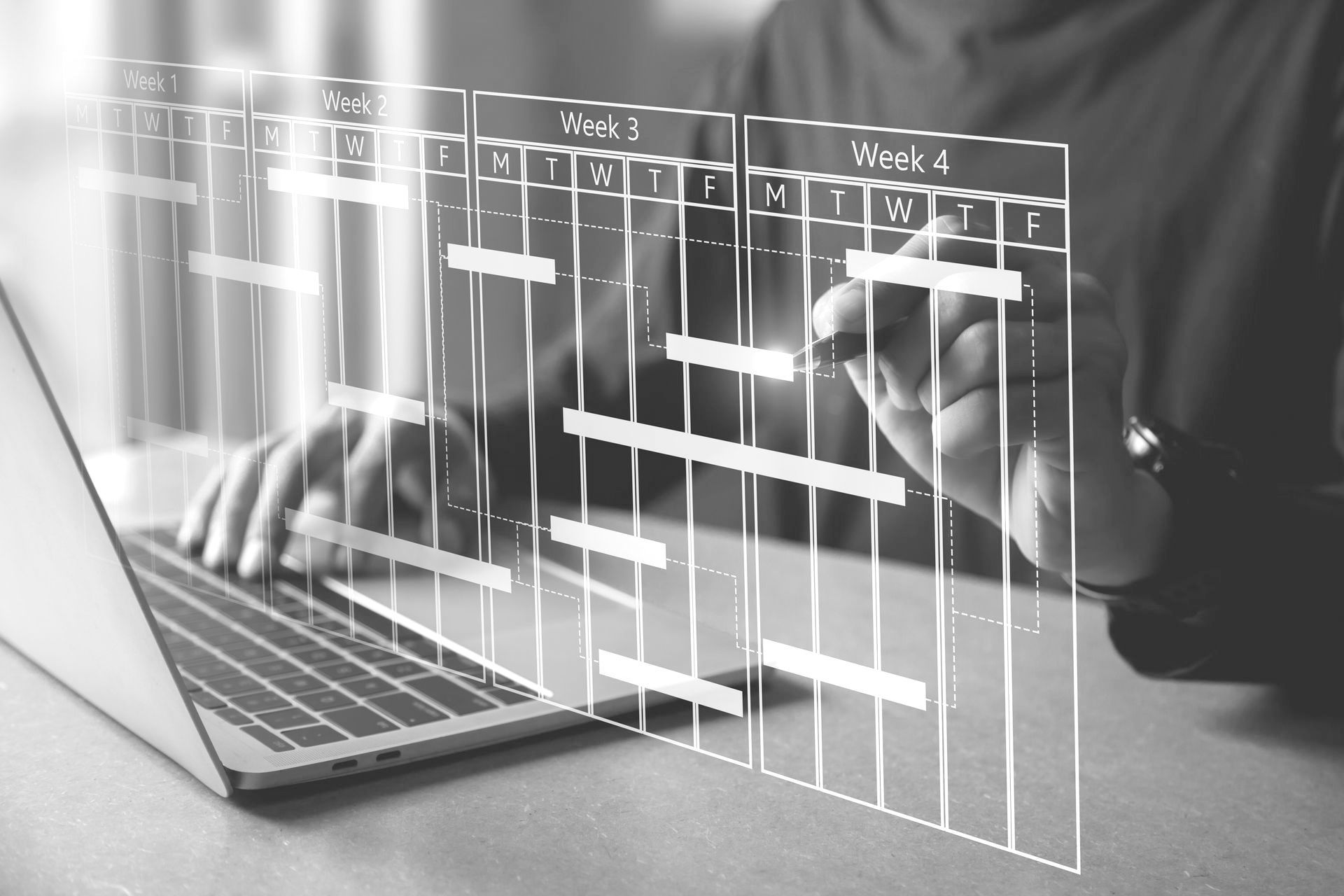 Mensch an Laptop mit Kalender