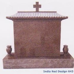 A rectangular red granite headstone with a gabled top, a small cross, and two side vases on a base labeled India Red Design.