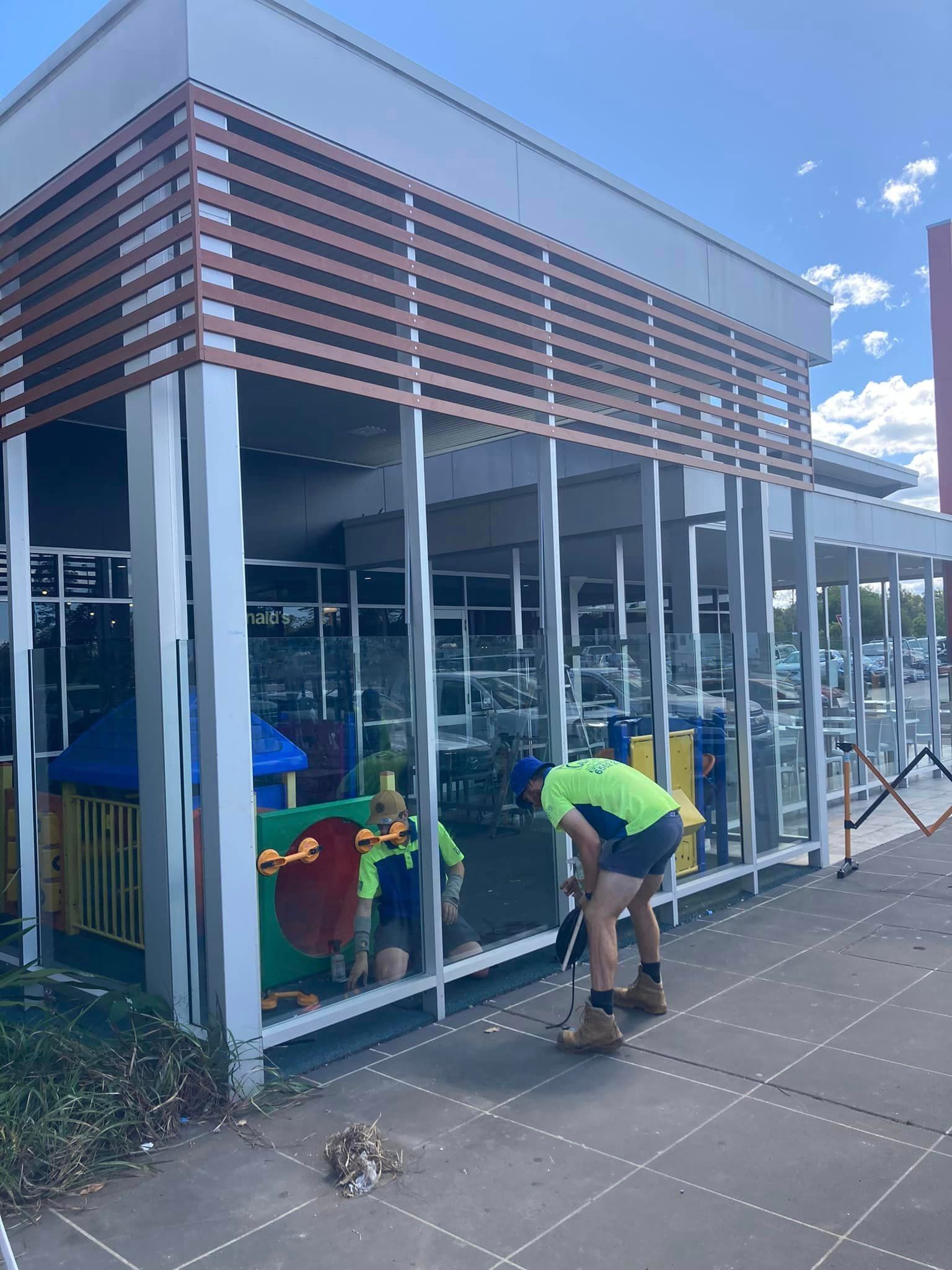 Installing Laminated Glass — Patterson Glass Works in Kempsey, NSW