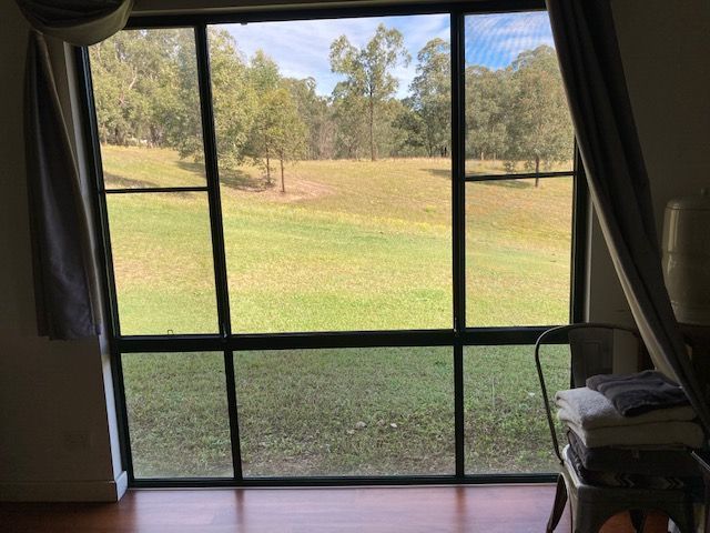 Tinted Windows on the side of a house— Patterson Glass Works in Kempsey, NSW