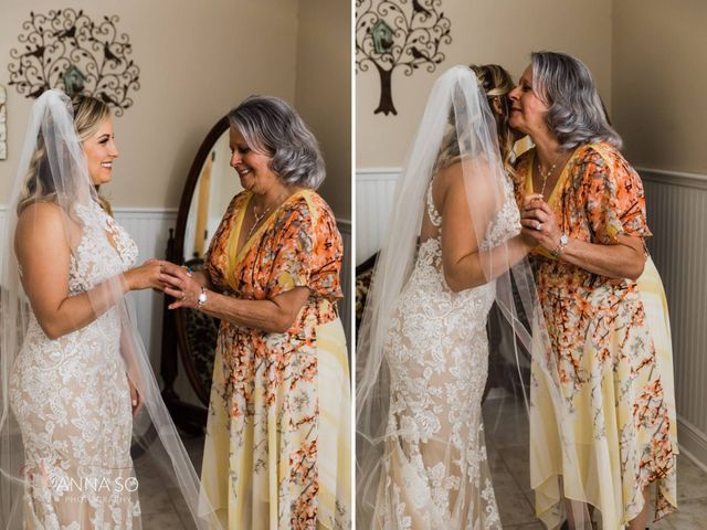 A bride is getting ready for her wedding with her mother.