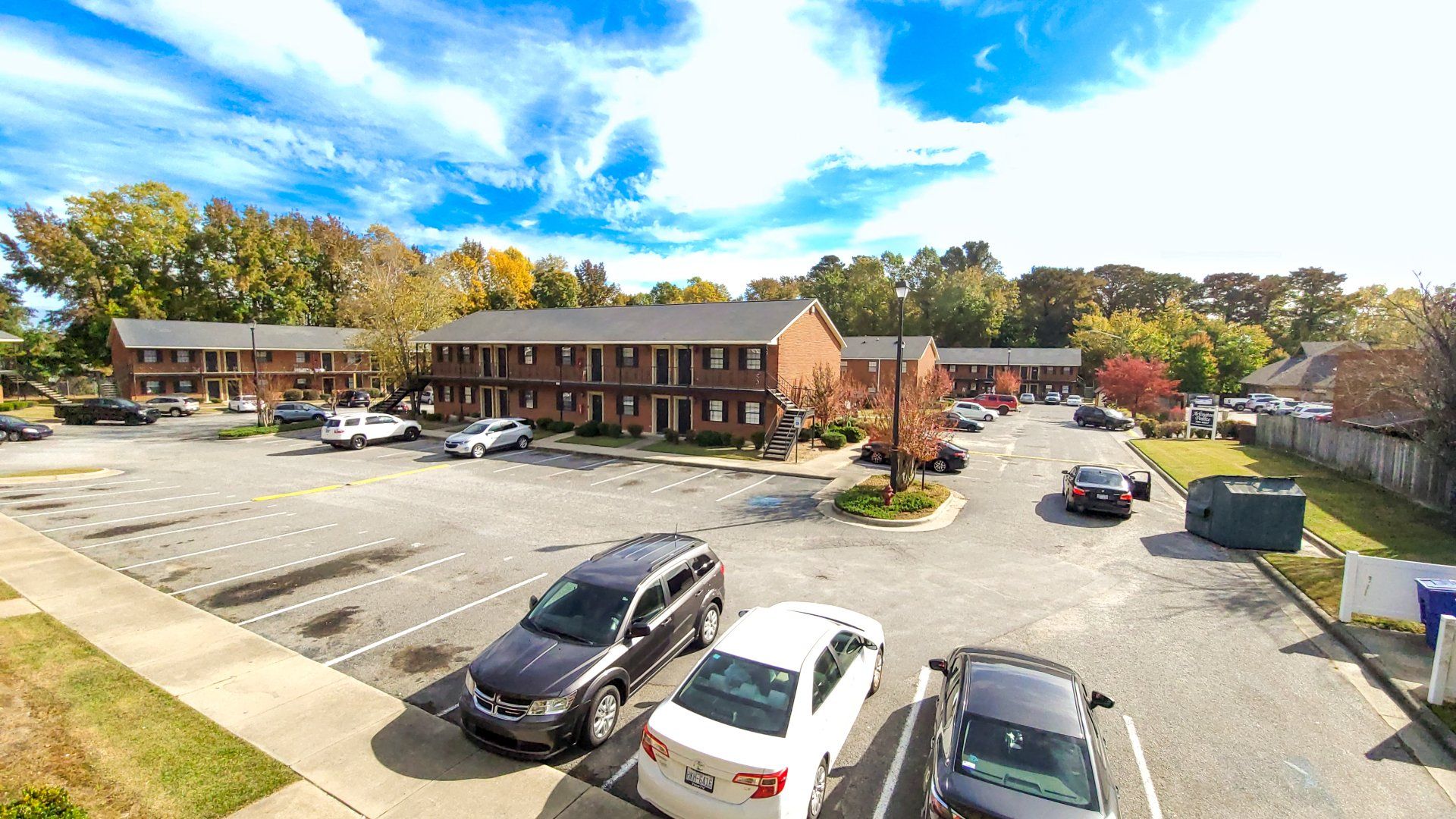 Exterior of complex with parking lot