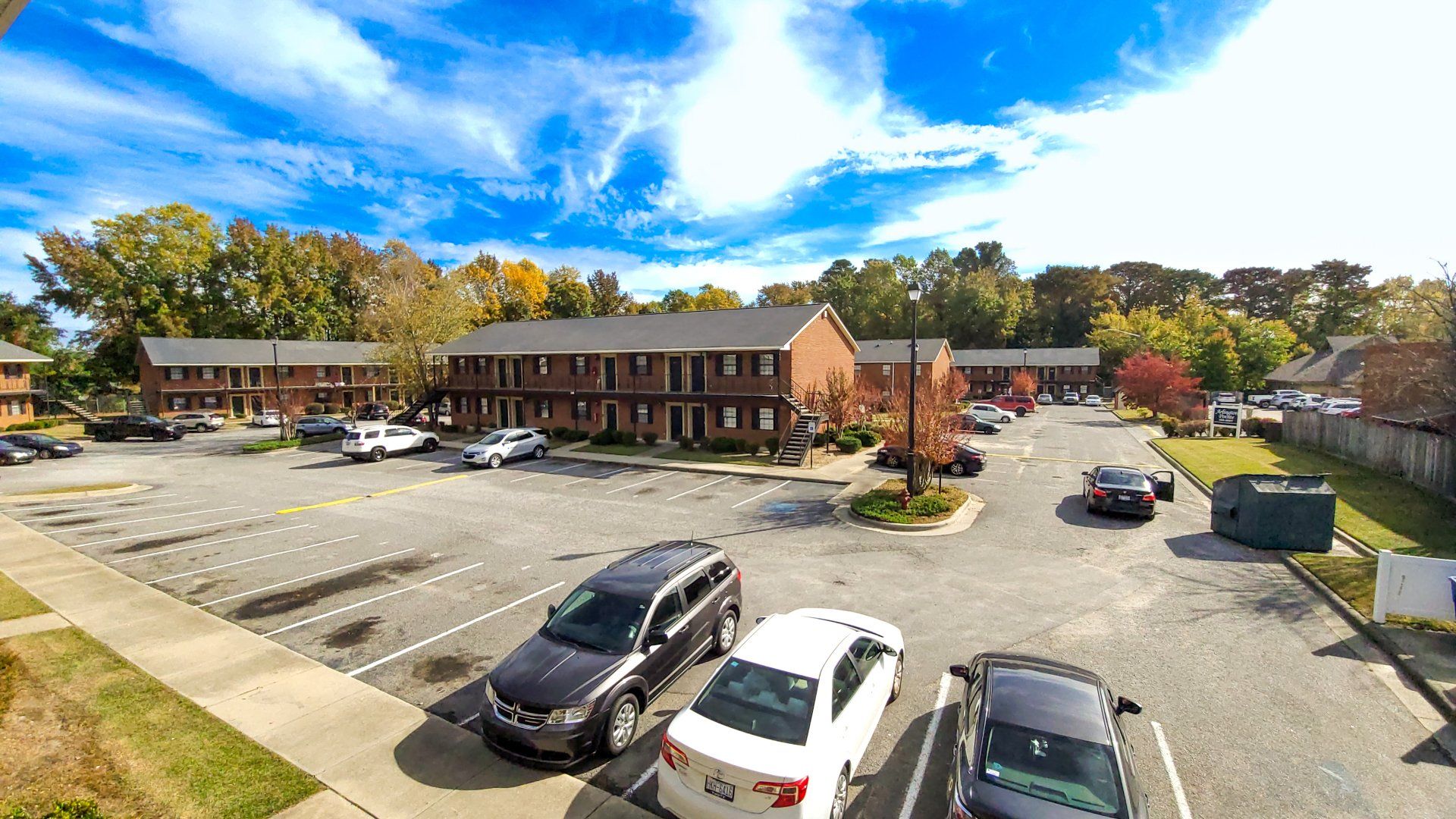 Exterior of complex with parking lot