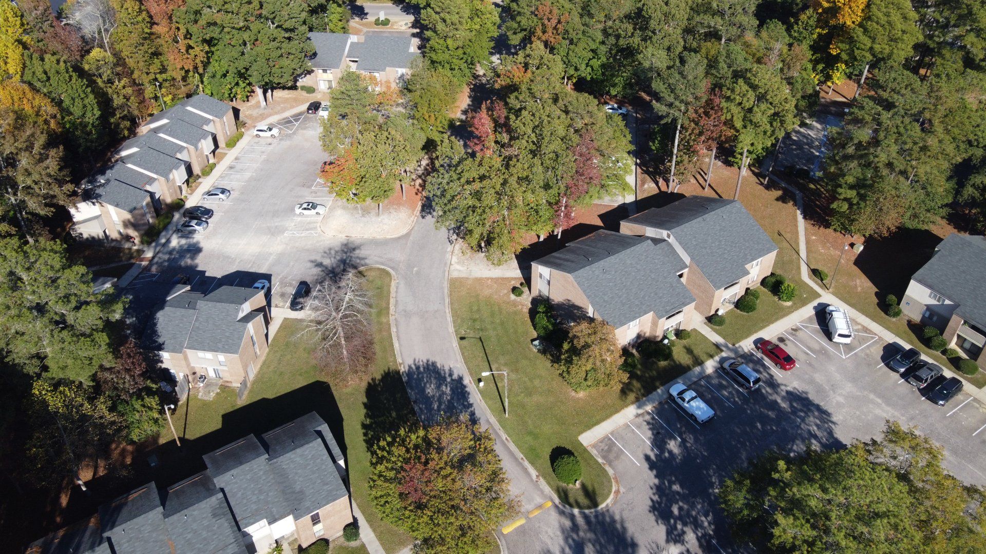 Aerial view of complex with lots of trees