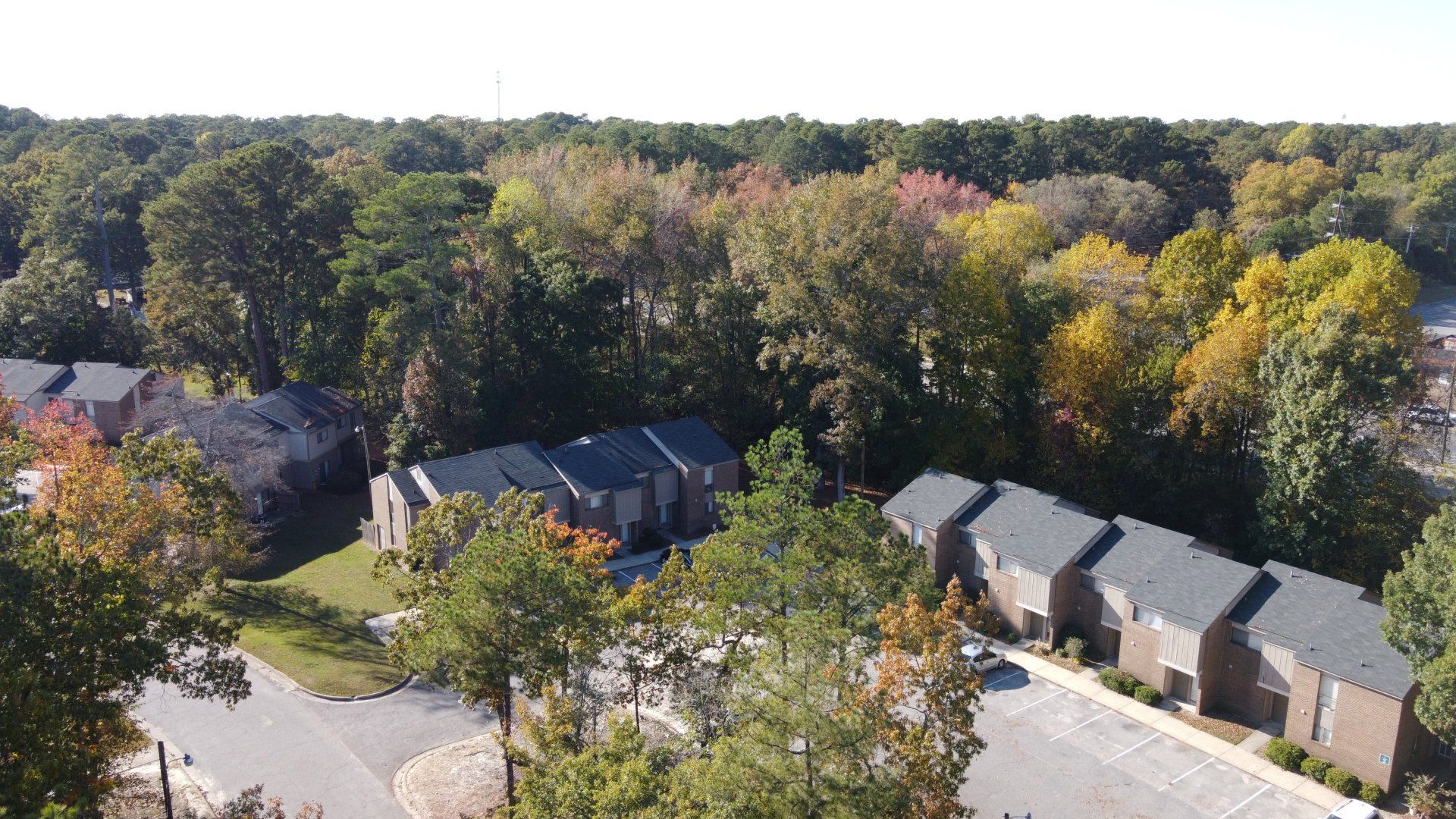 Aerial view of complex with lots of trees
