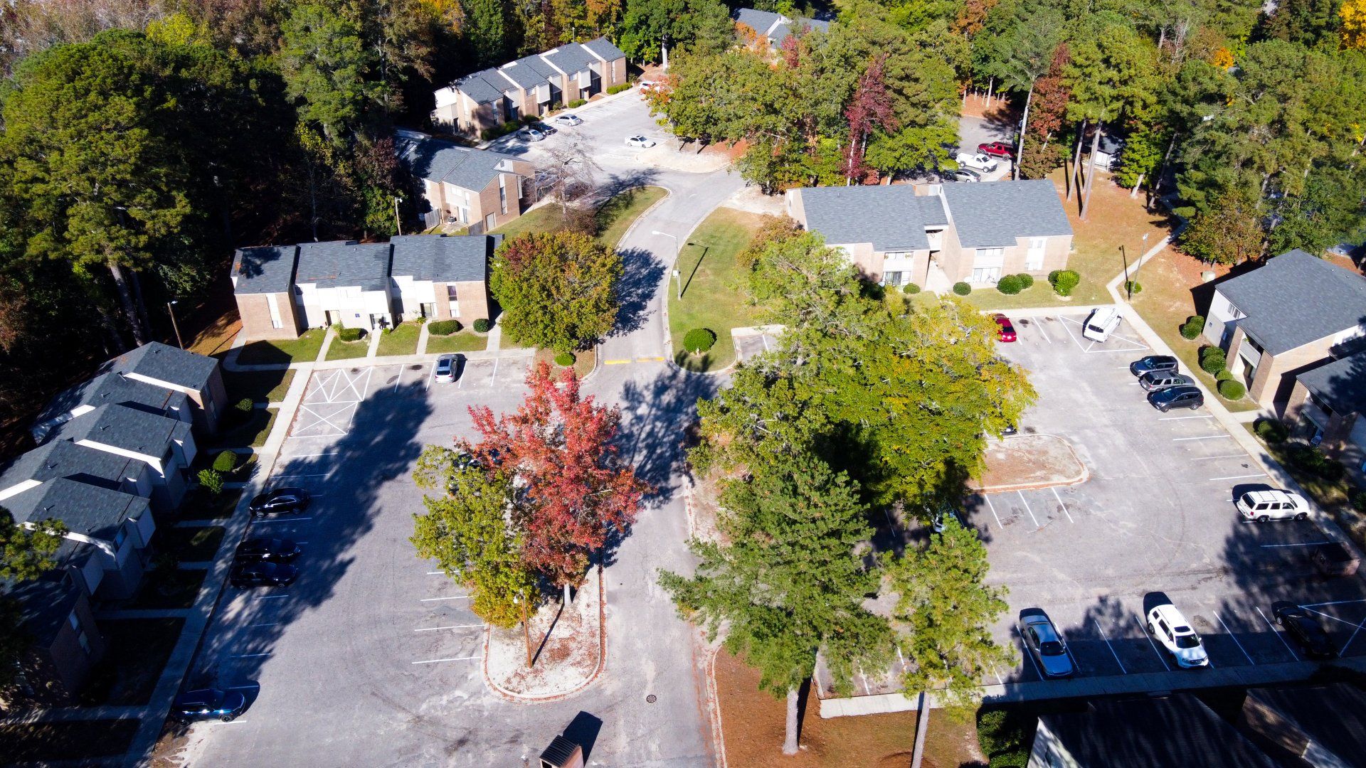 Aerial view of complex with lots of trees