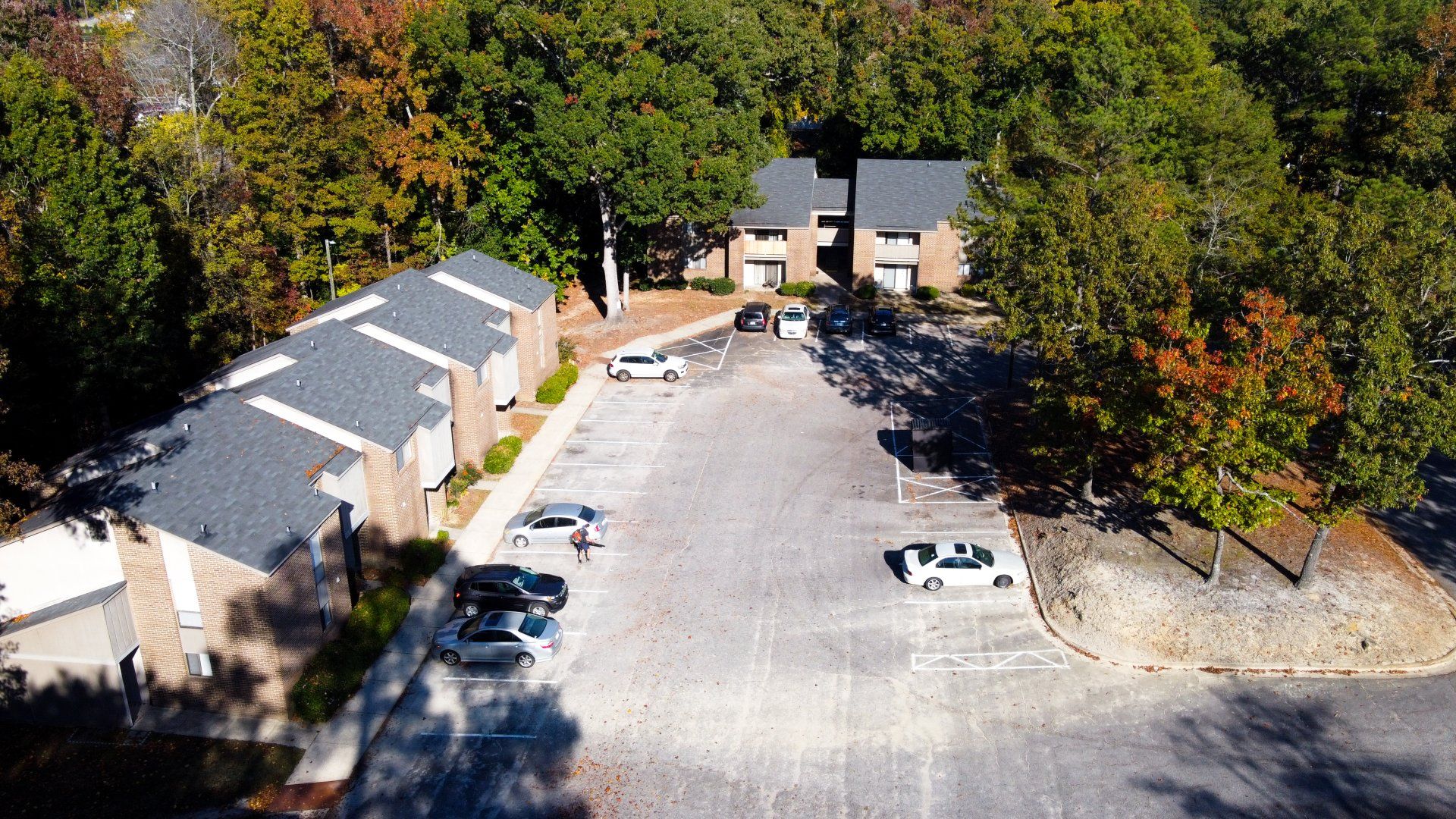 Aerial view of complex with lots of trees