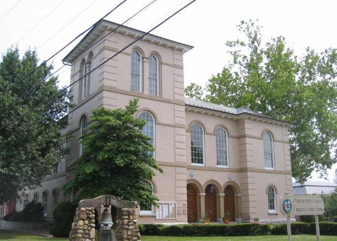 A large building with a sign that says welcome