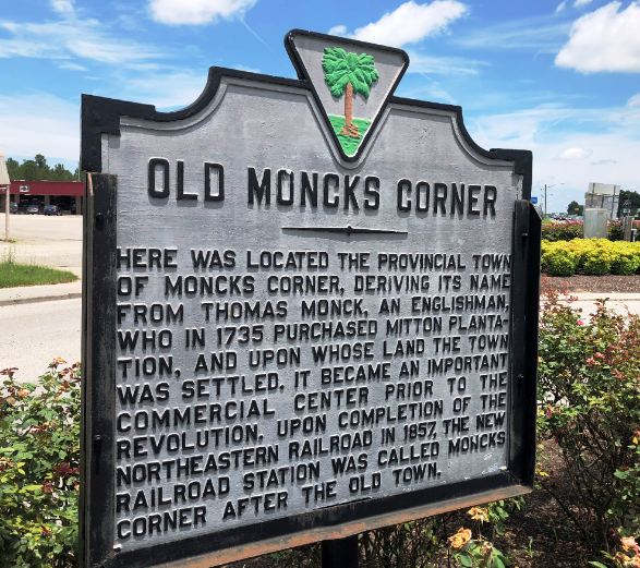 A sign that says old moncks corner on it