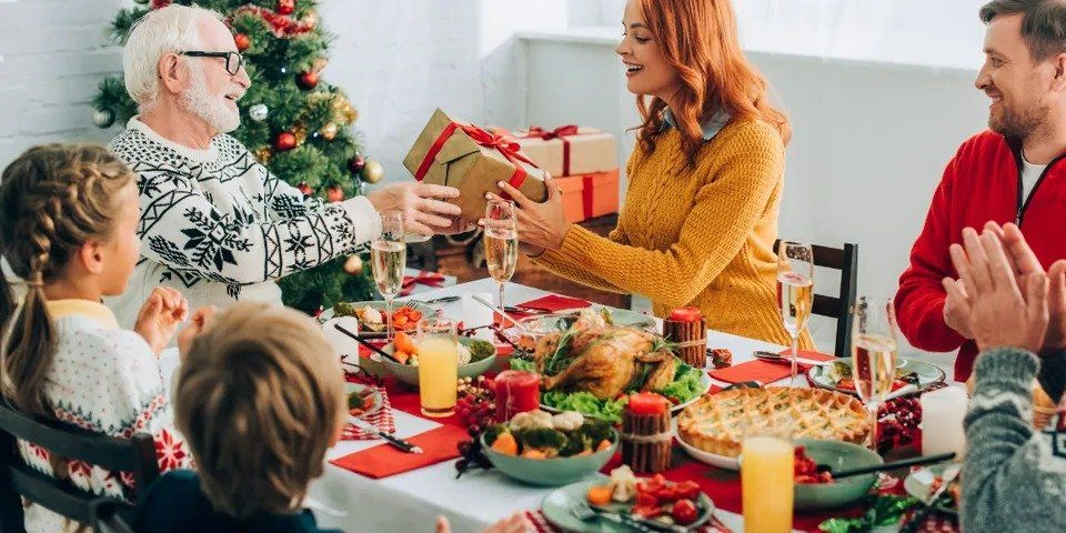 Family Celebrating Christmas Feast – Archdale, NC – Queen’s Septic Tank Service