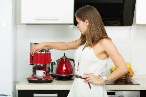 Woman Making Coffee – Archdale, NC – Queen’s Septic Tank Service