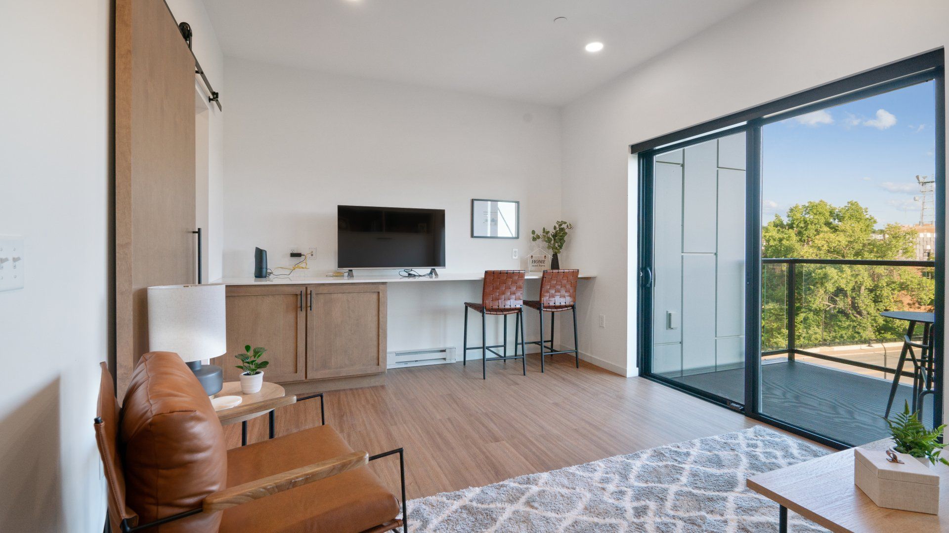 Andante living room with sliding glass door
