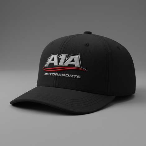 Black AIA Motorsports baseball cap with embroidered logo on a gray background