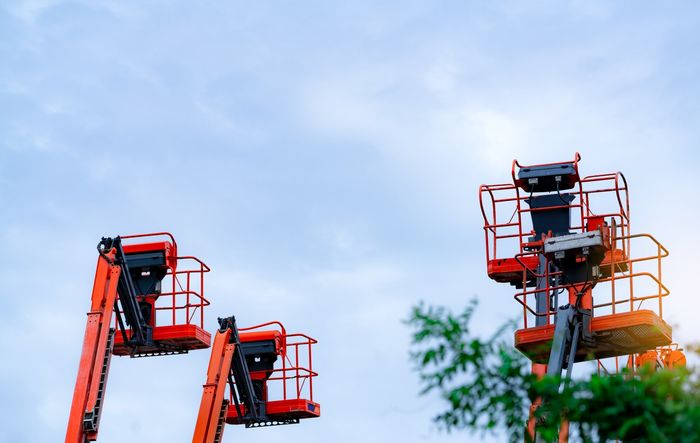 a basket truck on a crane