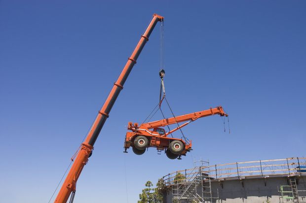 a red crane truck