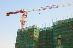 a mobile crane on a building