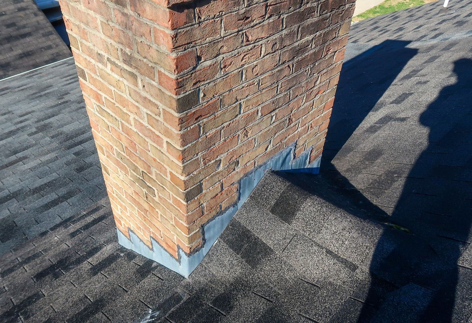 a roof with a chimney on top of it