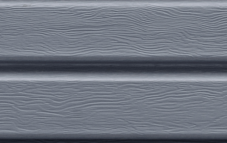 a close up of a gray siding texture .