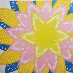Abstract floral pattern with layered pink, yellow, and blue petal shapes and dotted accents
