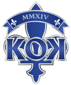 Blue Greek letters Kappa Omega Psi with “MMXIV” on a shield-like emblem