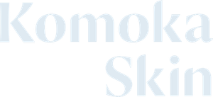 The komoka medical logo is on a green background.
