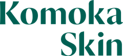 The komoka medical logo is on a green background.