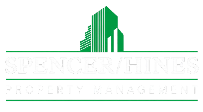 Green stylized building logo with “Spencer Realty Management” text on a white background