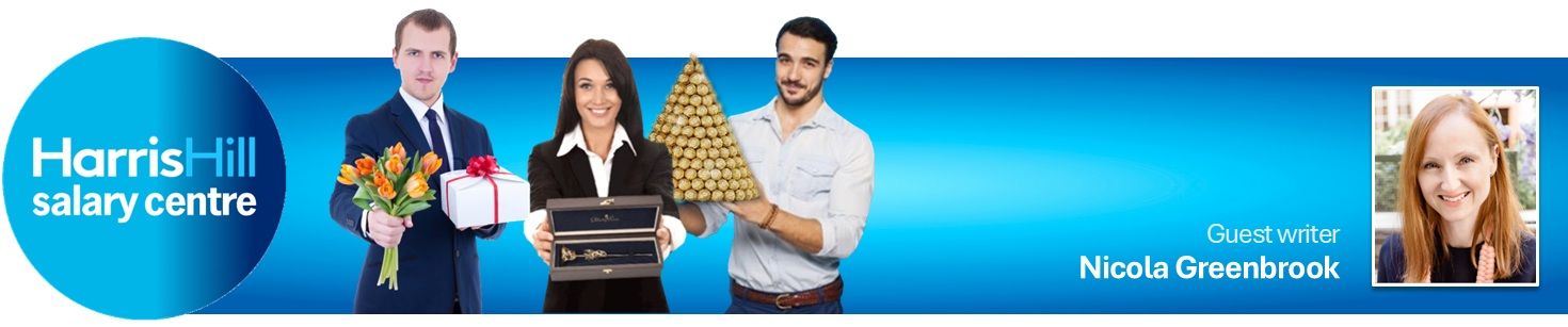 People holding gifts and a Christmas tree, with a woman in a photo in the right corner.