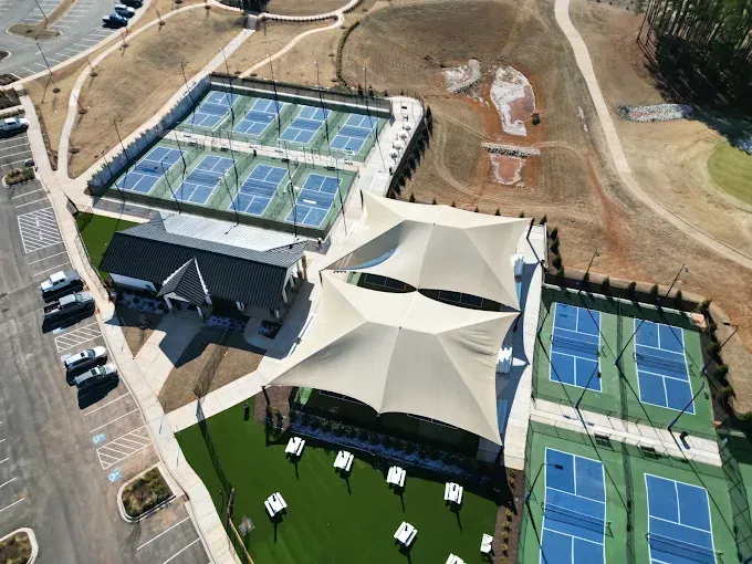 Aerial view of sitework surrounding outdoor courts