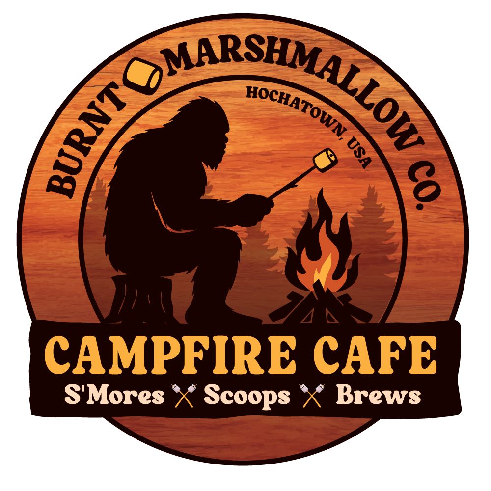 Wooden Burnt Marshmallow Co. Campfire Cafe logo with camper, marshmallow roast, and campfire