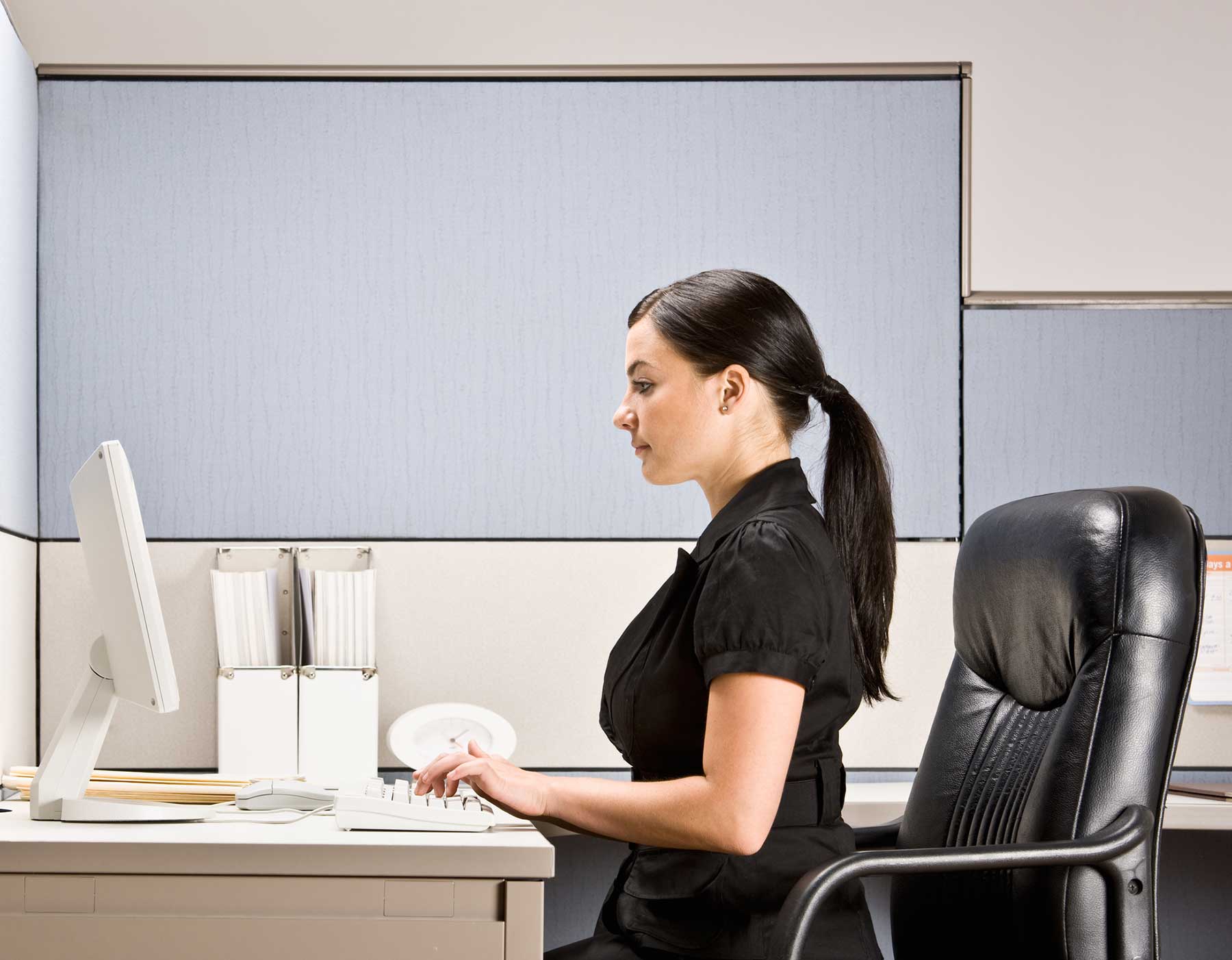 Woman Using Computer — Portage, MI — Cornerstone Chiropractic Center