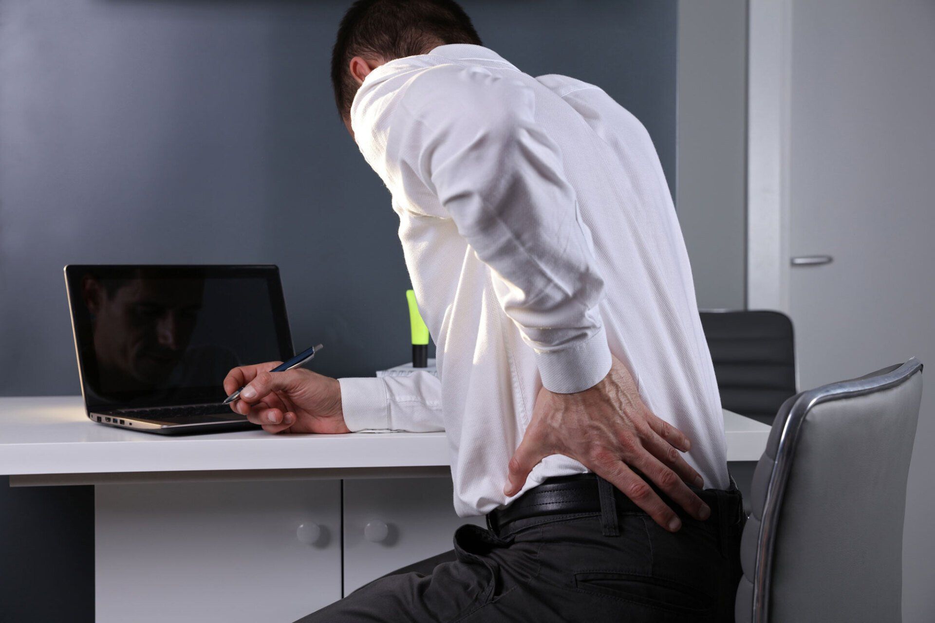 Man Having Back Pain — Portage, MI — Cornerstone Chiropractic Center