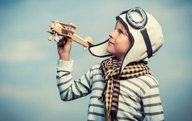 Little Boy Playing with Toy Plane — Portage, MI — Cornerstone Chiropractic Center