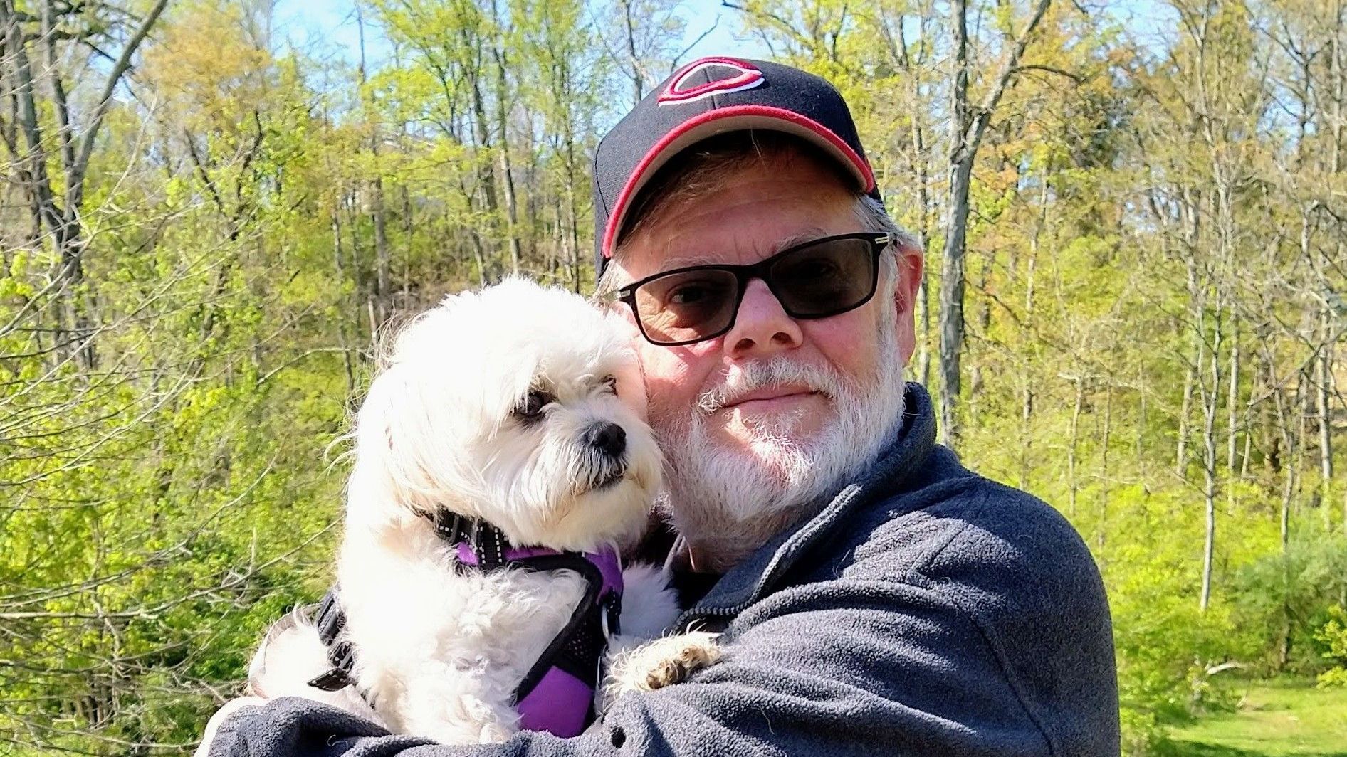 Randy Conn in nature with dog