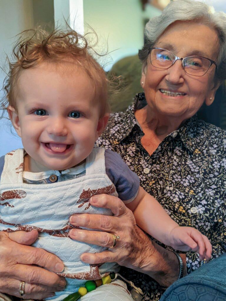 Grandmother holding grandchild