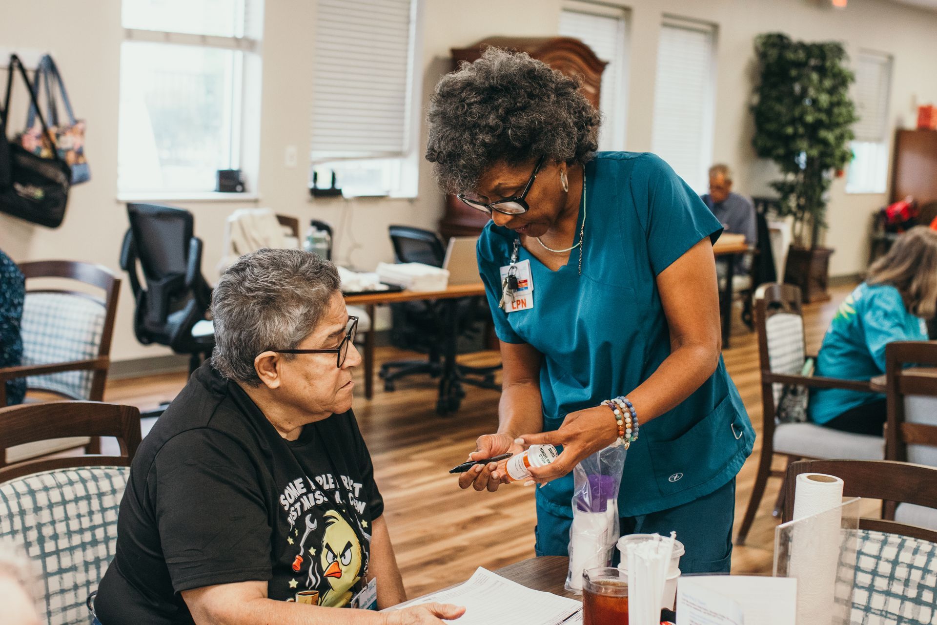PACE participant receiving medical care services from nurse check up