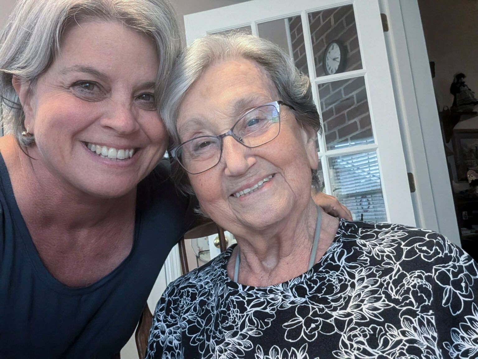 Middle aged woman caring for mother